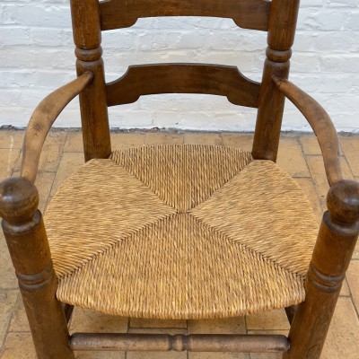 Paire de fauteuils en chêne et paille par Charles Dudouyt 1940