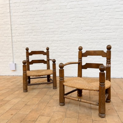 Pair of oak and straw armchairs by Charles Dudouyt 1940