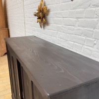 Back of counter with wooden sliding doors