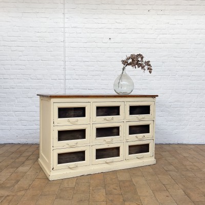 Early 20th century wooden seed cabinet