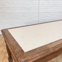 Large drapery table in wood and natural stone