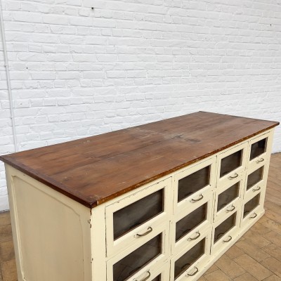 Early 20th century wooden seed cabinet with 12 drawers