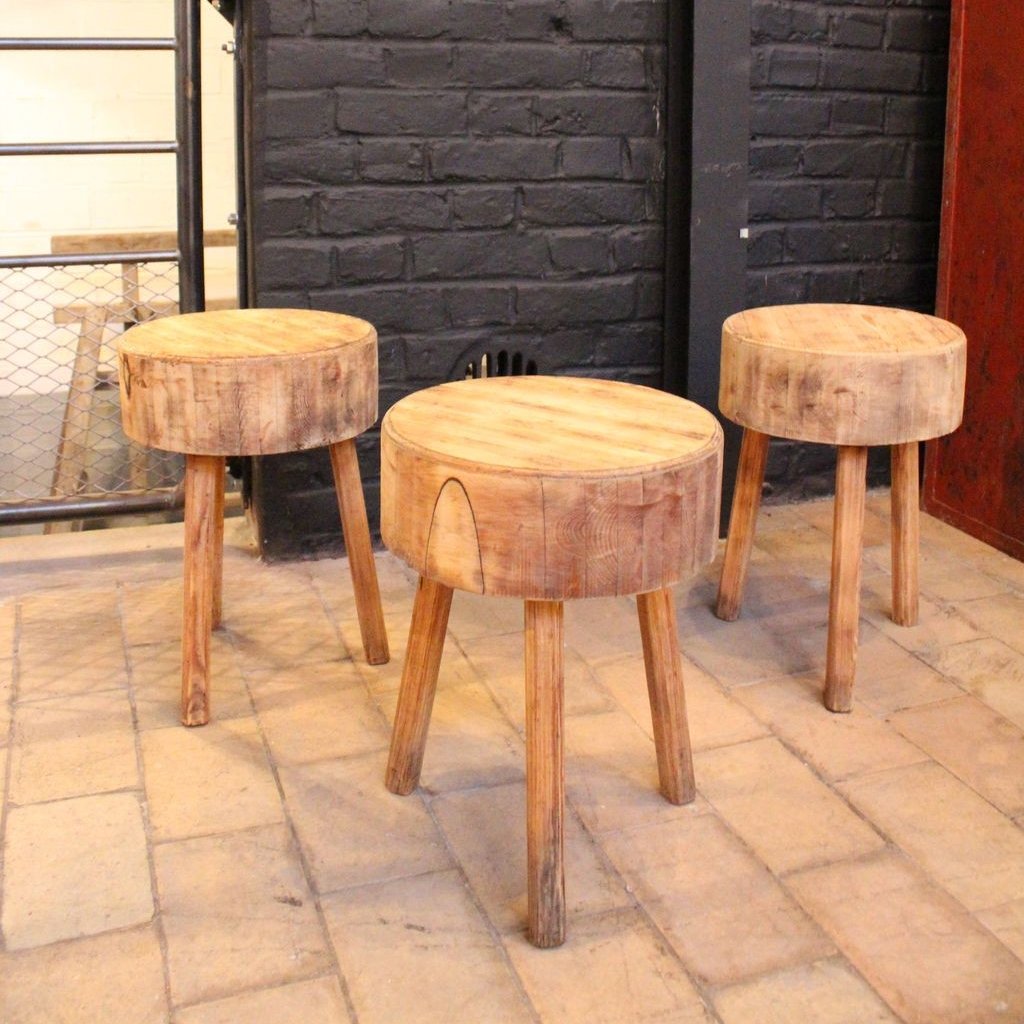 Set of tripod wooden stools