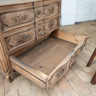 Louis XV style French oak crossbow chest of drawers, early 20th century