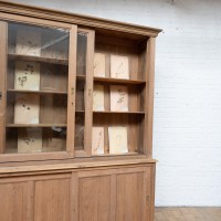 Large oak bookcase with sliding doors in 1930