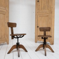 Pair of wooden workshop chairs, 1930