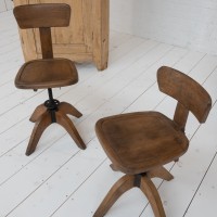 Pair of wooden workshop chairs, 1930