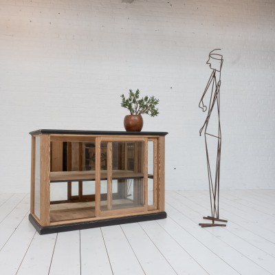 Wooden display case with sliding doors, 1930