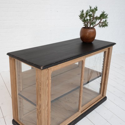 Wooden display case with sliding doors, 1930