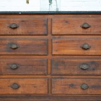 Wood and stone furniture with drawers, 1930