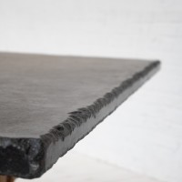 Large wood and stone dining table