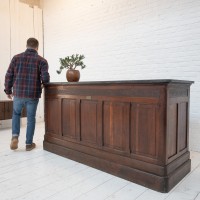 Antique oak and stone counter, 1900