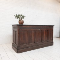 Antique oak and stone counter, 1900