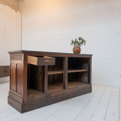 Antique oak and stone counter, 1900