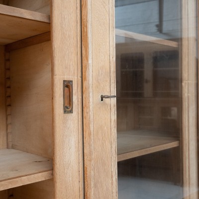 Antique oak bookcase with sliding doors, 1930