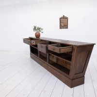 Large oak trapezoid counter, late 19th century