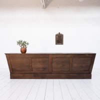 Large oak trapezoid counter, late 19th century