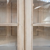 Large two-door wooden display case, 19th century