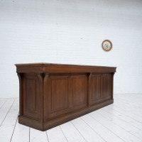 Ancien comptoir de commerce en chêne, 1900