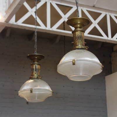 Pair of Holophane glass and brass suspensions