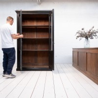 French 2-door display cabinet in blackened walnut, early 20th century.