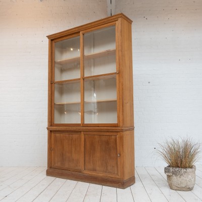Oak display cabinet with sliding doors, 1930