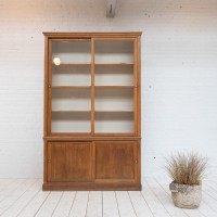 Oak display cabinet with sliding doors, 1930