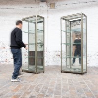 Pair of Art Deco brass display cabinets, 1920s
