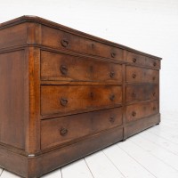 Large chest of drawers in walnut and stone, 19th century