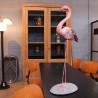 Pink flamingo in cement