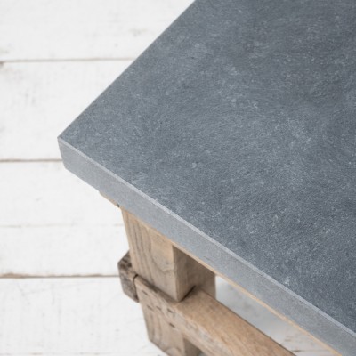 Set of primitive consoles in wood and blue stone