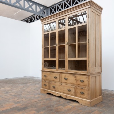 Large wooden display cabinet dating from the early 20th century