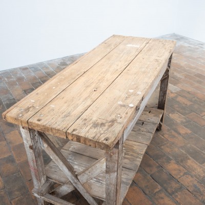 Ancienne table d’atelier à entretoises croisées – Début du XXe siècle