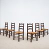 Ensemble de 6 chaises en bois et paille style G. ROBERT vers 1950