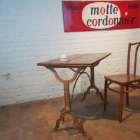 Former bistro table. Brasserie parisienne