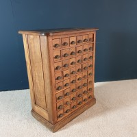 Cabinet of clockmaker in oak 48 drawers handles shells