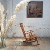 Rocking-chair in walnut and straw from the 50s