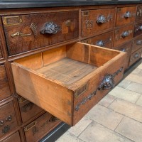 Former base cabinet in oak hardware