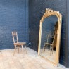 Grand miroir ancien en bois et stuc doré