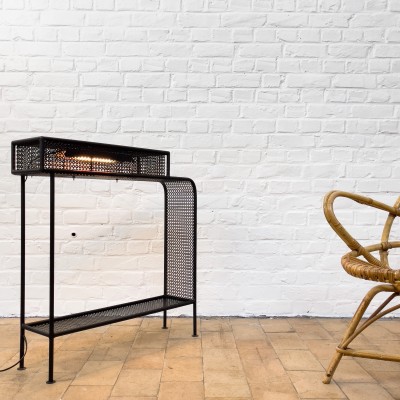 Perforated metal console 1950